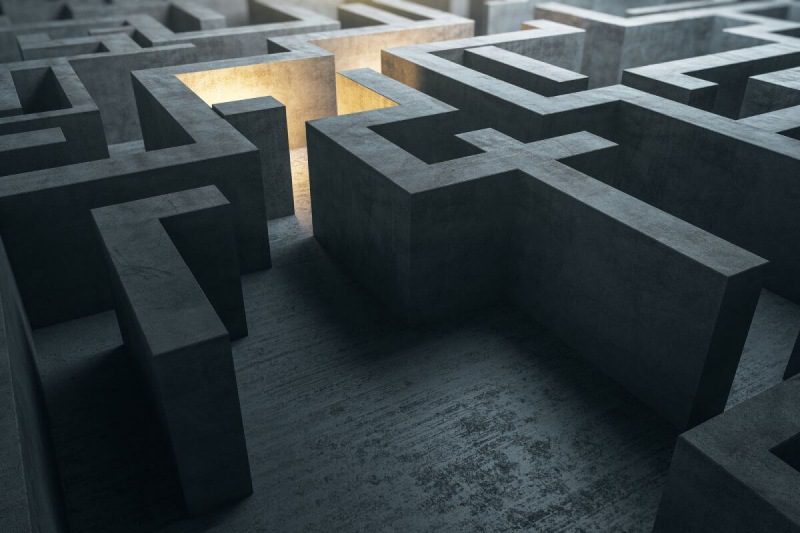 An image of a maze with a light shining through it.